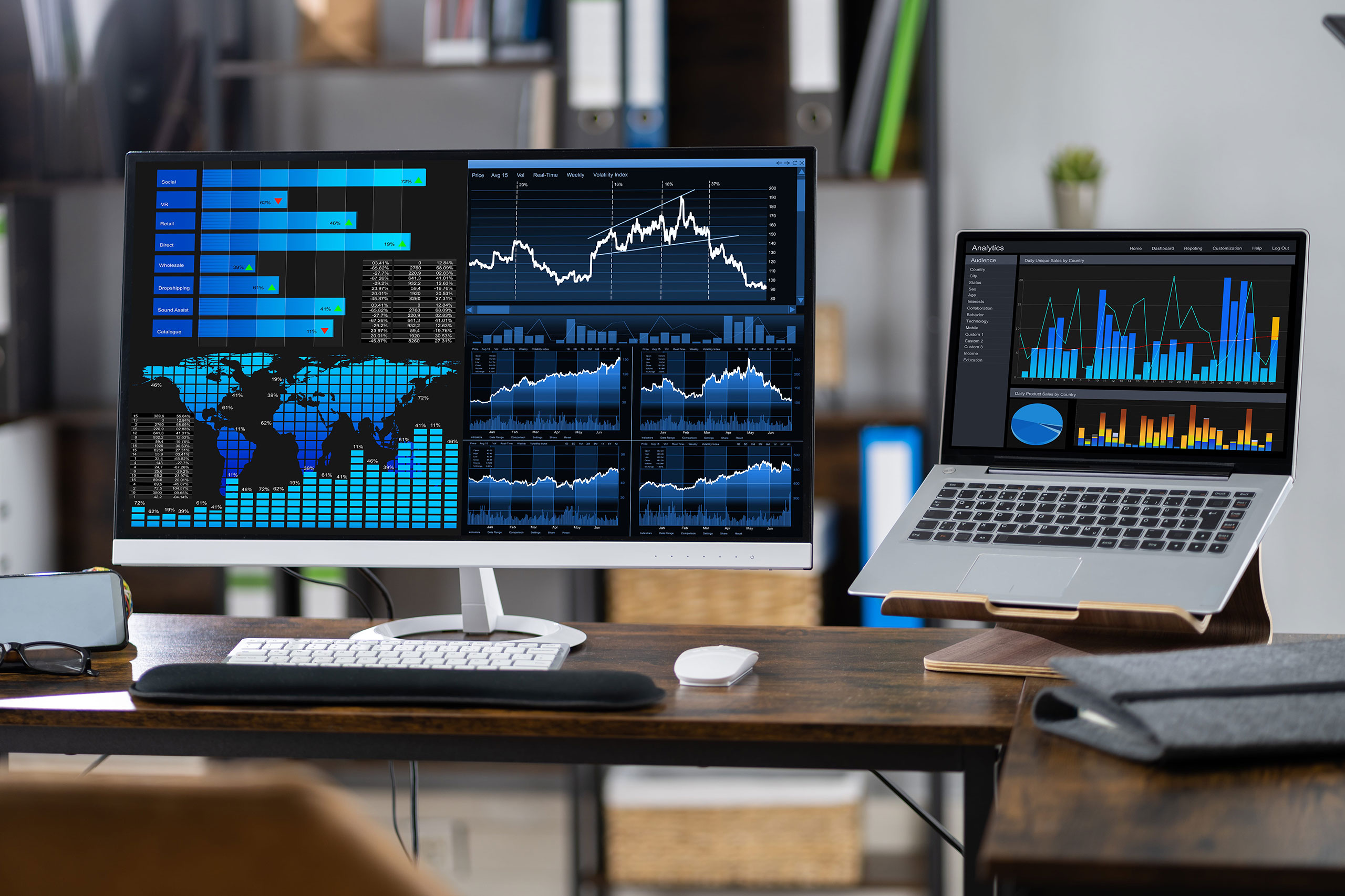 Data screens on a modern desk